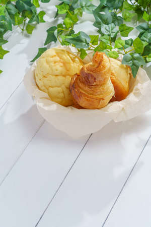 Bread isolated on wooden table