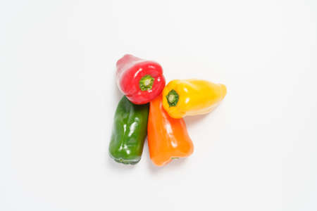 colorful paprika on wooden tableの写真素材