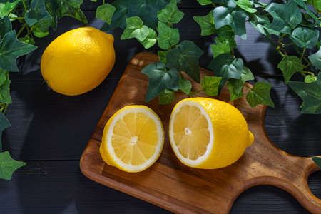 Fresh lemon fruit isolated on wooden table