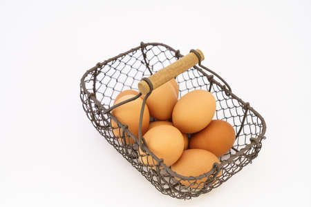 Fresh eggs on wooden tableの写真素材