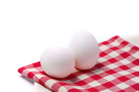 Fresh eggs on wooden tableの写真素材