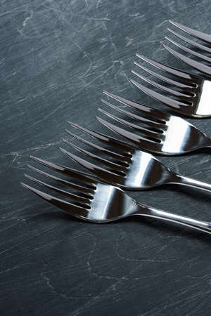 Fork on wooden table