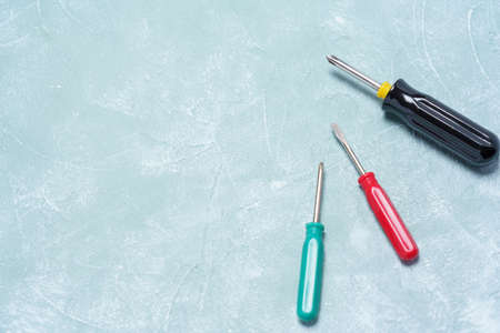Screwdriver on a wooden board