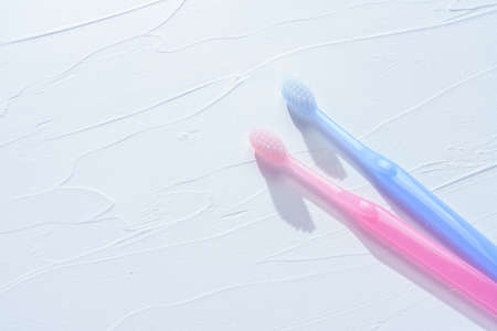 Toothbrushes on wooden tableの写真素材