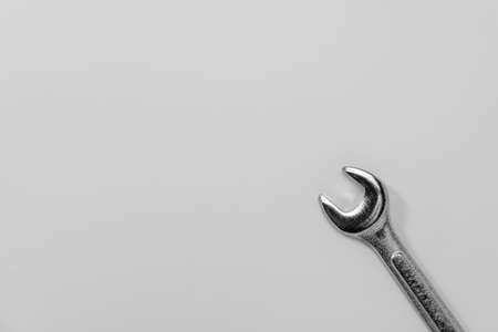 Set of spanners and wrenches on dark background