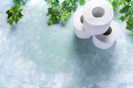 Toilet paper on wooden boardの写真素材