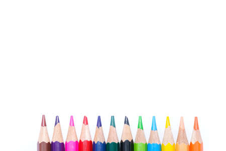 Colored pencils on white background