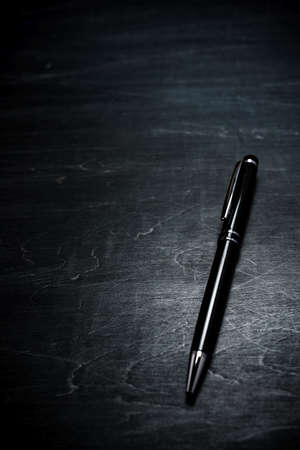 Pen on dark backgroundの写真素材
