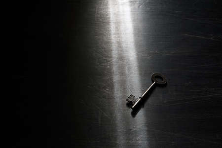 Vintage key on dark backgroundの写真素材