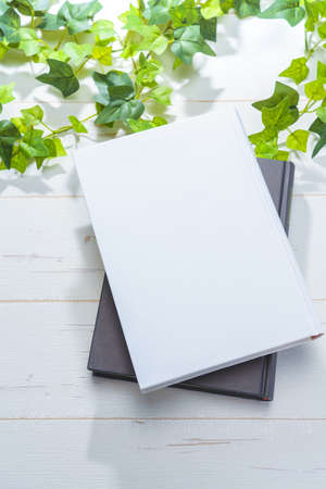 Hardback book on wooden table