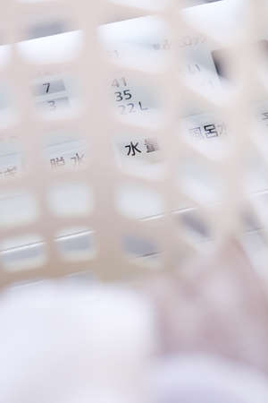 Laundry basket and washing machine in the laundry room