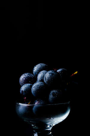 Fresh grapes on dark backgroundの写真素材