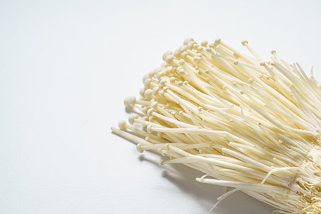 Enoki mushroom on white background