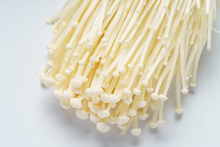Enoki mushroom on white background