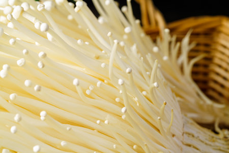 Enoki mushroom on wooden tableの写真素材