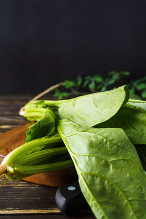 Fresh spinach on wooden table