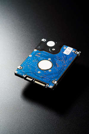 2.5 inch hard disk drive isolated on dark background