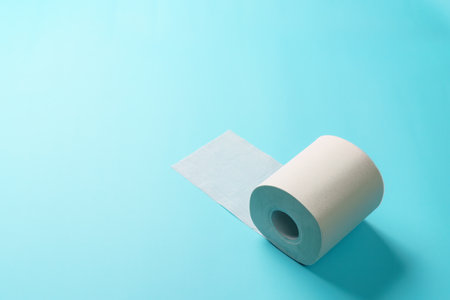 Toilet paper isolated on color backgroundの写真素材