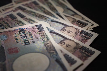 Japanese banknotes on dark backgroundの写真素材