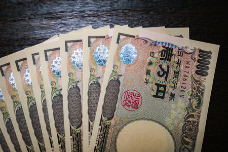 Japanese banknotes on dark backgroundの写真素材