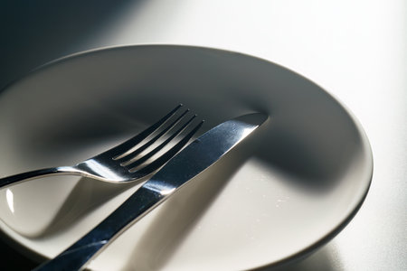 Fork and knife on dark backgroundの写真素材