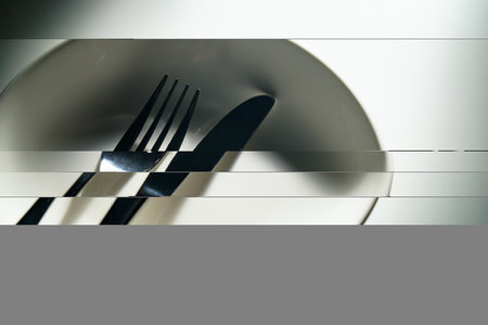 Fork and knife on dark backgroundの写真素材