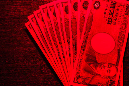 Japanese banknotes on dark backgroundの写真素材