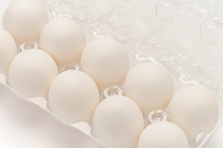 Fresh eggs on white background