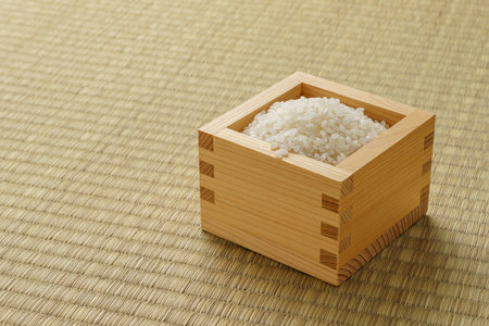 Japanese white rice on tatami matの写真素材