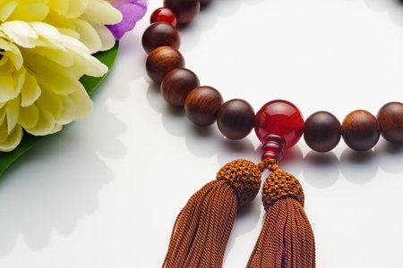 Buddhist rosary. Wooden buddhist rosary with tassel.の写真素材