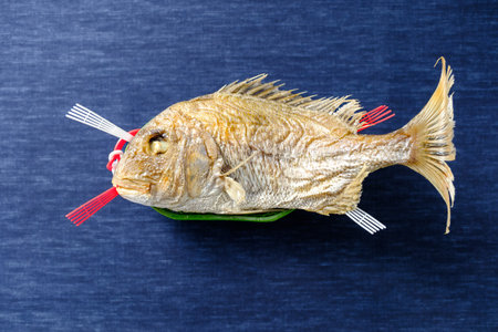 Whole grilled sea bream with salt