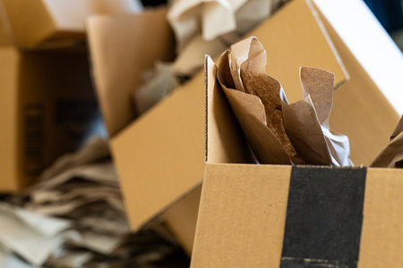 Cardboard boxes stacked in a room