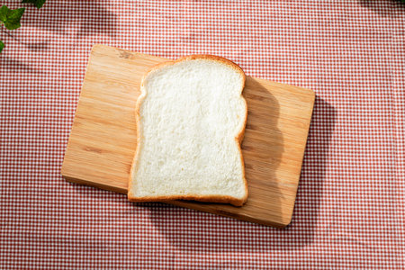 Sliced bread on wooden table
