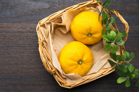 Fresh Yuzu Citrus Fruits on Wooden Table