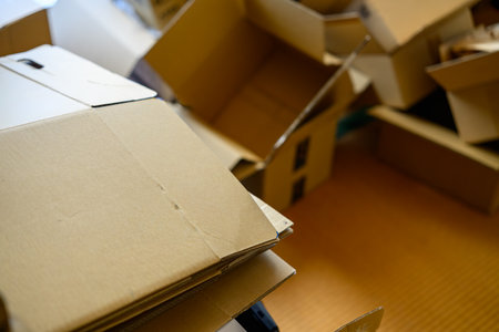 Pile of Empty Cardboard Boxes After Unpacking or Deliveryの写真素材