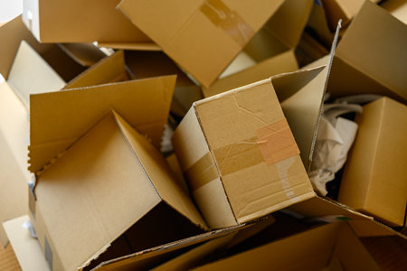 Pile of Empty Cardboard Boxes After Unpacking or Deliveryの写真素材
