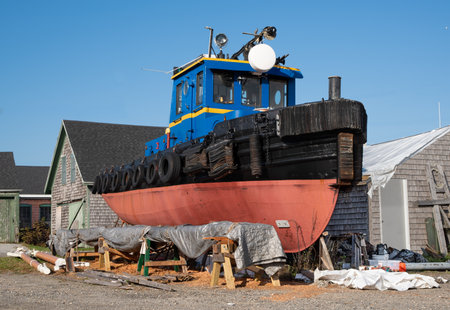 Old Tugboat Under Repair:  A well-preserved tugboat awaits further restoration at a New England...