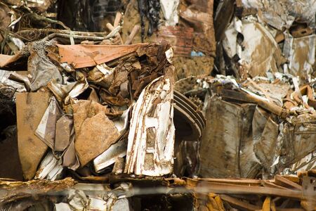 A variety of scrap metal lies in a heap