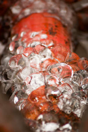 Ice on a metal surface. Icing on a metal surface close upの写真素材