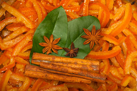 Candied orange peel and spices. Succade is candied orange peel, lemon leaves, cinnamon and star aniseの写真素材