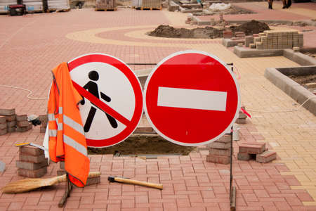 Paving slabs laying works. Prohibitory road signs. Repair of the coating of the pedestrian zone....