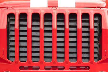 Car radiator grille fire close-up shot