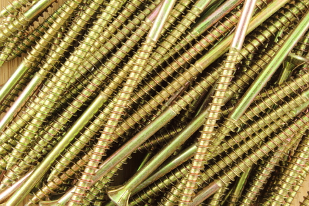 composition of wood screws on a wooden board