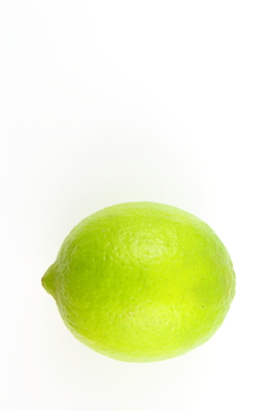 composition of a fresh lime fruit isolated on a white background with copy spaceの写真素材