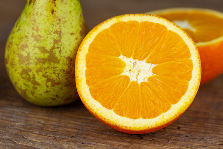 fruits on a wooden board in closeup viewの写真素材