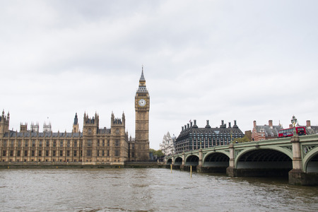 View from the Thames of the Houses of Parliament with the famous Big Ben tower and the Westminster...