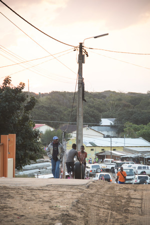 African kids playing with a car tire on the streets in Punta do Ouro, Mozambiqueのeditorial素材