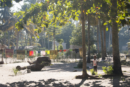 PRAIA DO TOFO, MOZAMBIQUE  CIRCA JULY 2015: African village with typical straw huts between palm trees in Praia do Tofo in Inhambane, Mozambiqueのeditorial素材