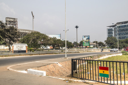 ACCRA, GHANA - JANUARY 2016: Street view in Accra in Ghana with a large billboard for church