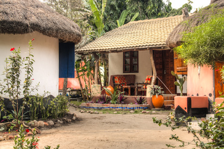 Houses and cabins or huts in Big Milly's, the top resort in Krokobite, Accra, Ghanaのeditorial素材